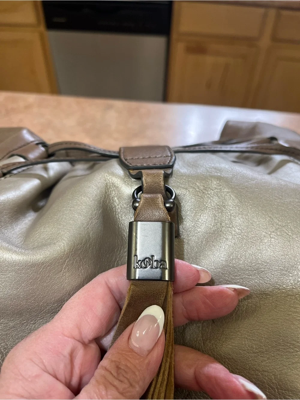 Kooba Metallic Taupe Leather Shoulder Bag with Tassel